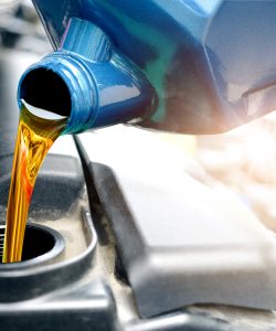 Refueling and pouring oil quality into the engine motor car Transmission and Maintenance Gear .Energy fuel concept.